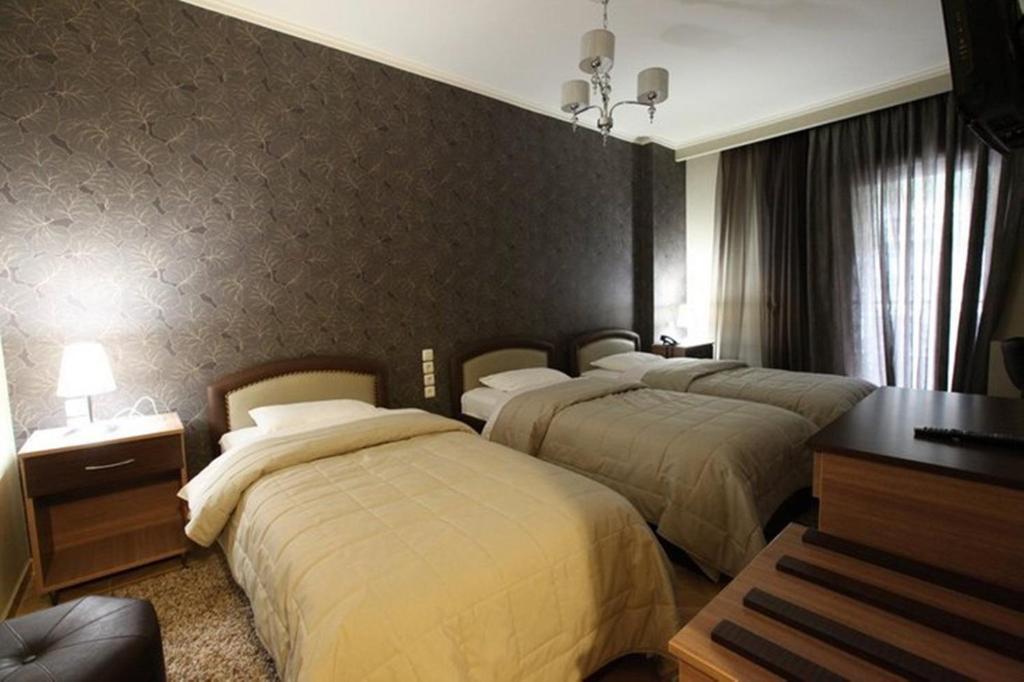 Delfini Hotel Menídion Quarto foto