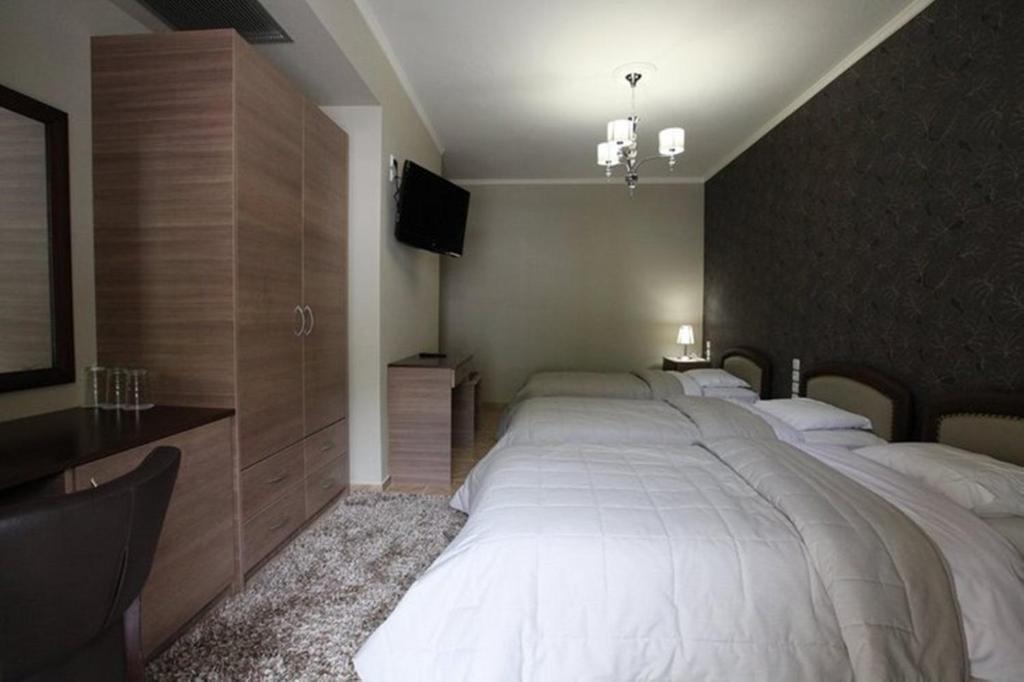 Delfini Hotel Menídion Quarto foto